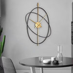 Horloge Murale "Simple Art" – Design Oval Métal & Mouvement Silencieux - Vignette | La Belle Horloge