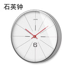 Horloge Murale "Zénith" – Design Nordique Suspendu en Métal Doré - Vignette | La Belle Horloge