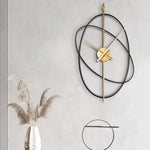 Horloge Murale "Simple Art" – Design Oval Métal & Mouvement Silencieux - Vignette | La Belle Horloge