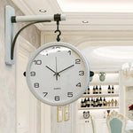 Horloge Double Face Oslo – Métal Scandinave pour Salon et Bureau - Vignette | La Belle Horloge
