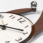 Horloge Murale Bois Noyer Forme Navette avec Balancier – Design Élégant Salon - Vignette | La Belle Horloge