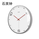 Horloge Murale "Zénith" – Design Nordique Suspendu en Métal Doré - Vignette | La Belle Horloge