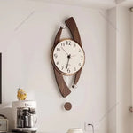 Horloge Murale Bois Noyer Forme Navette avec Balancier – Design Élégant Salon - Vignette | La Belle Horloge