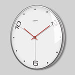 Horloge Murale "Zénith" – Design Nordique Suspendu en Métal Doré - Vignette | La Belle Horloge